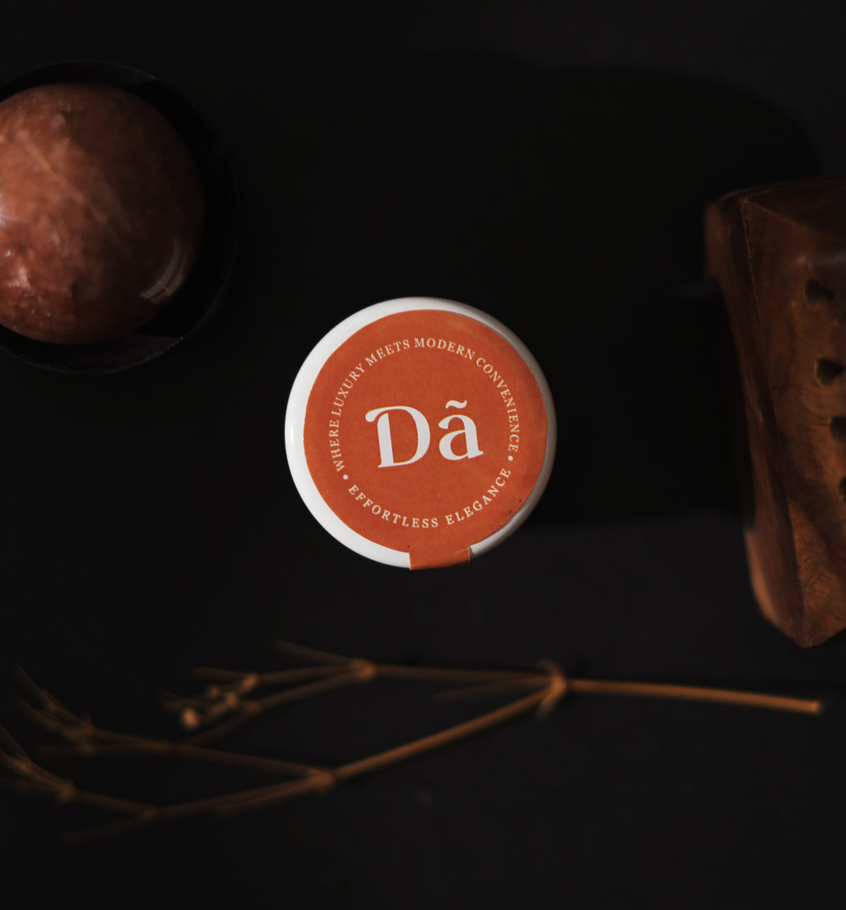 Oudiction solid perfume cap with Dã Mehvish monogram