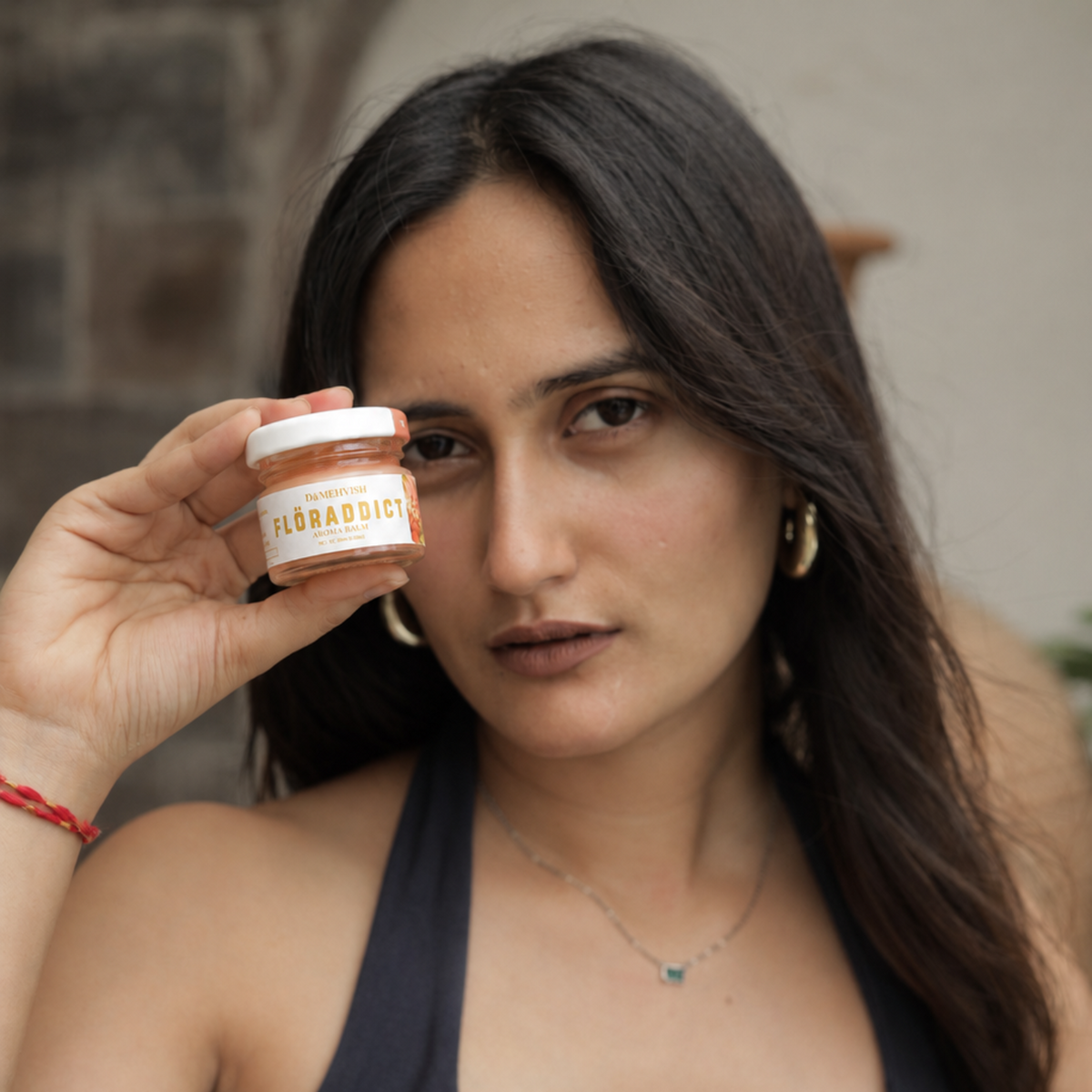 Floraddict solid perfume by Dã Mehvish with female model